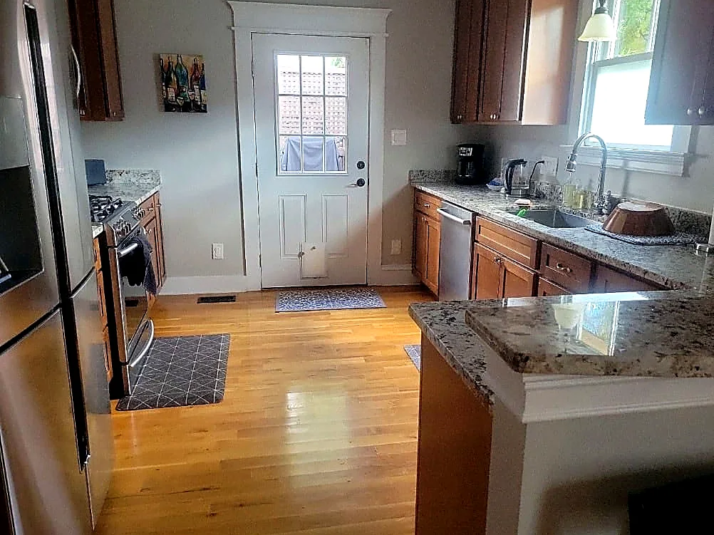 Clean kitchen with granite countertops